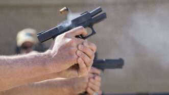 A Glock pistol is fired at a range. | Jebb Harris/ZUMAPRESS/Newscom