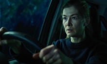 Rosamund Pike is behind the wheel of the car-set thriller "Hallow Road." 
