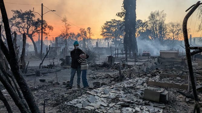 Harbut-Singh family sees what's left of their home after the Eaton Fire in January 2025.