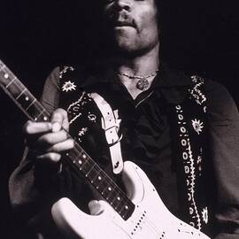 Jimi Hendrix Performs by Hulton Archive