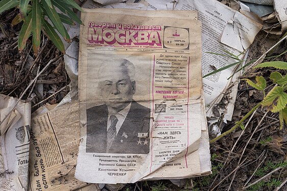 Old USSR newspaper with a photo of Konstantin Chernenko, which was found at an illegal landfill in the forest.