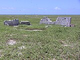 Settlement remains, radio mast in the background