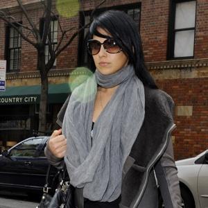 WARRIOR POSE: Hilaria Thomas, Alec Baldwin’s yoga instructor fiancée, walks to her studio yesterday after standing by her man on Twitter, professing her love for him and taking some shots at his alleged stalker.