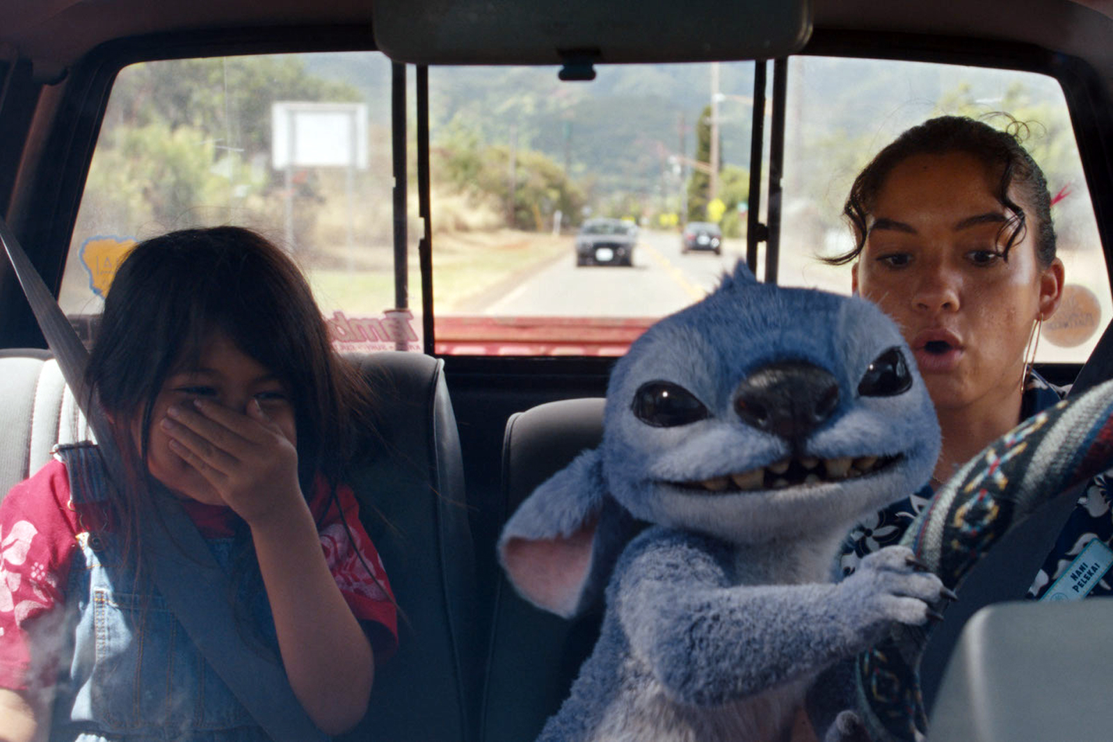 (L-R) Maia Kealoha as Lilo, Stitch and Sydney Agudong as Nani in Disney’s live-action LILO & STITCH. Photo courtesy of Disney. © 2025 Disney Enterprises Inc. All Rights Reserved.